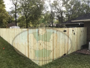 Wood fence - with Stockade Gate - Dog ear pickets installed side by side - privacy fence from Big Jerry's Fencing - This style is called The "Baxter"