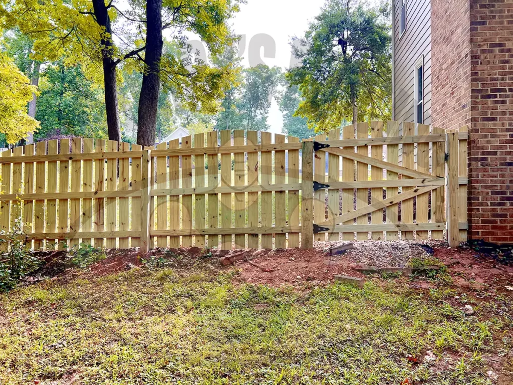 The Semi-Privacy Arch Top wood fence combines traditional picket styling with a modern twist, featuring an arch top design for smooth transitions in sloped areas, a one-and-a-half-inch gap between pickets for an open feel, and providing security without obstructing views, perfect for enhancing the natural beauty of your property.