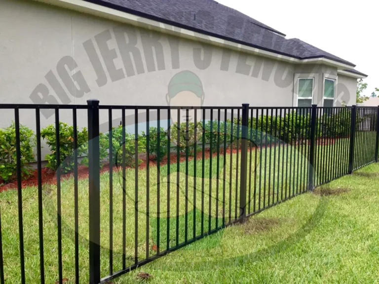 An Elon aluminum fence features a simple and sleek design with a smooth top and flush bottom rail, offering protection with minimal blockage, built to meet pool code compliance by increasing the distance between horizontal rails while maintaining the desired height, perfect for modern, safety-focused residential fencing.